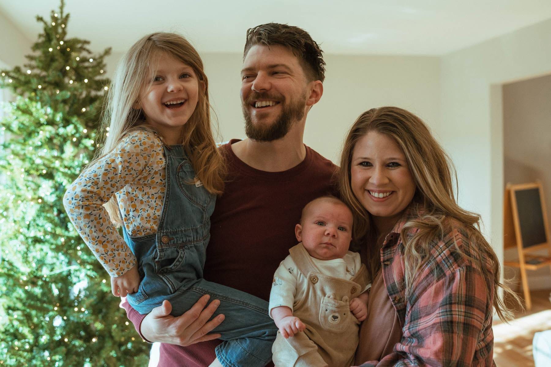 Sam, founder of Side Cut Painting, at home with his family in Northwest Ohio